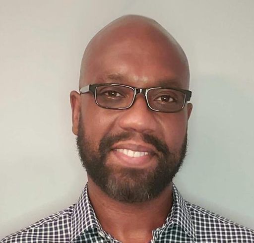 A headshot image of Corandle Johnson