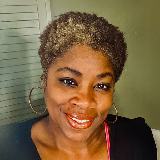 A headshot image of Janine Thomas