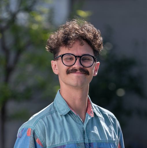 A headshot image of Justin Bain