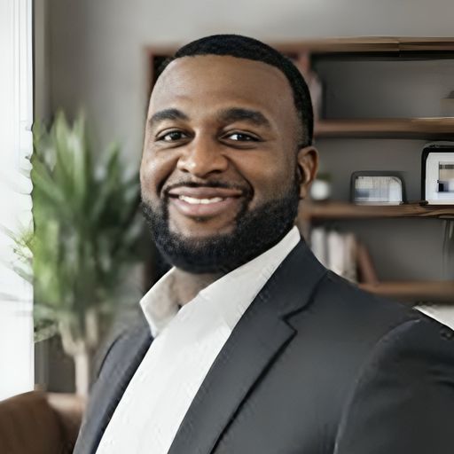 A headshot image of Marcus Pierre