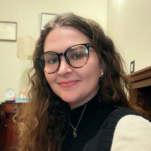 A headshot image of Kerrigan Spangler