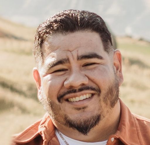 A headshot image of Jose Martinez