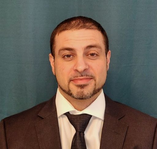 A headshot image of Matthew Cote