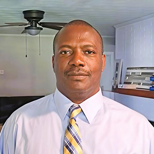 A headshot image of Adetunji Adenipekun