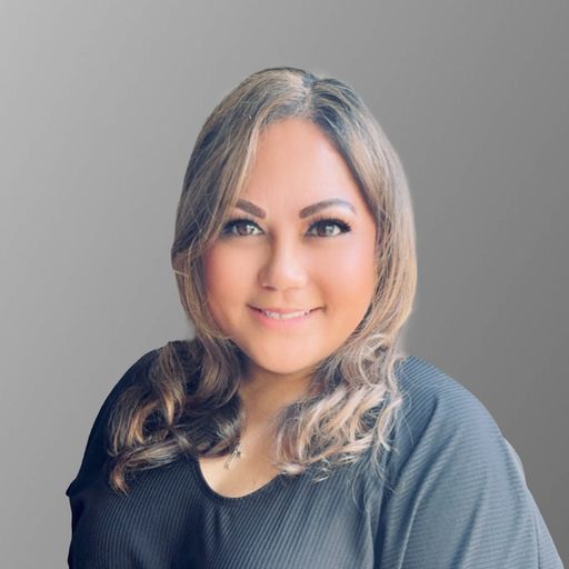 A headshot image of Desiree Milam
