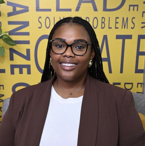 A headshot image of Melanie Clavelle