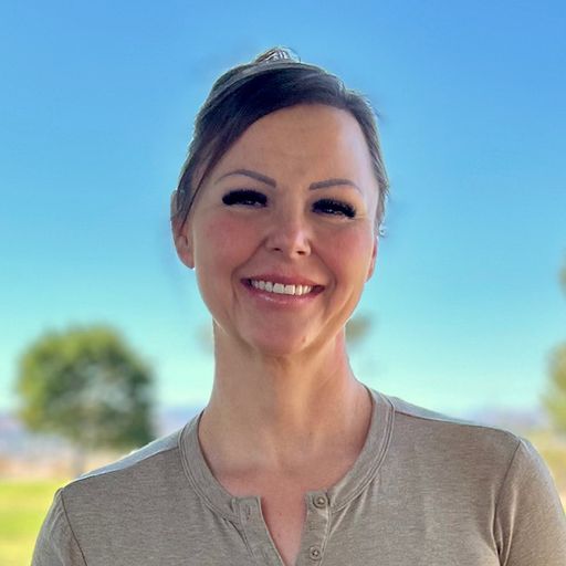 A headshot image of Jamie Baker