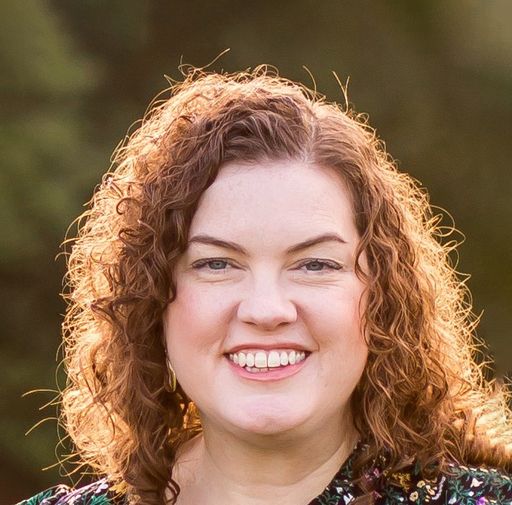 A headshot image of Erin Scarth