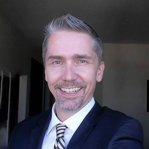 A headshot image of Christian Trausch