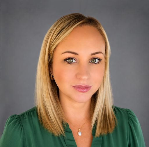 A headshot image of Felicia Conover