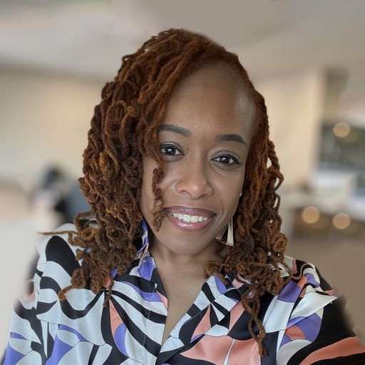 A headshot image of Adriane Weaver