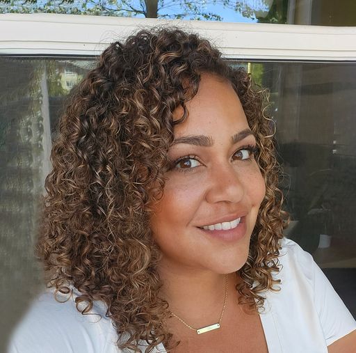 A headshot image of Maya Crim