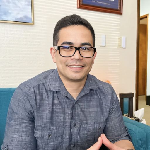 A headshot image of John Joseph