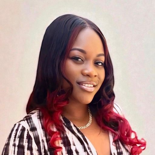 A headshot image of Erris-Sheron Dolberry