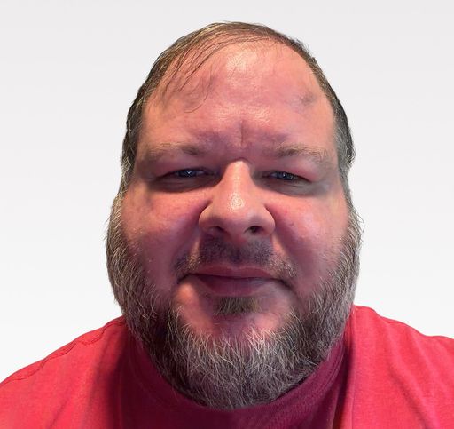 A headshot image of Lance Grace