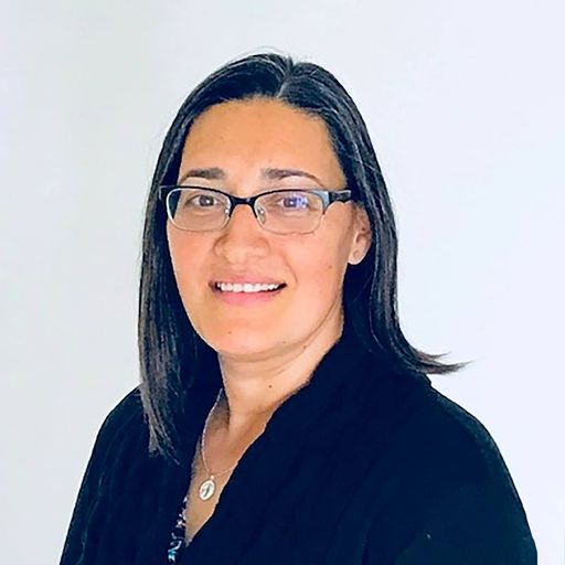 A headshot image of Dora Cario