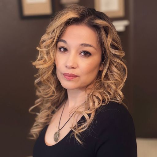 A headshot image of Carmen Kilpatrick
