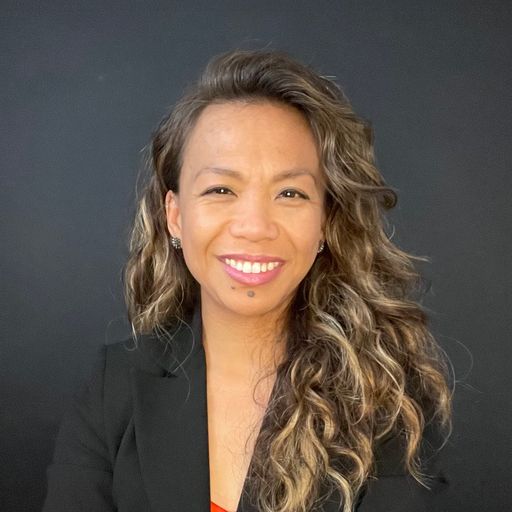 A headshot image of Desiree Aspiras