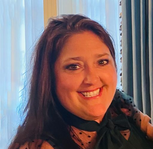 A headshot image of Angela Duffy