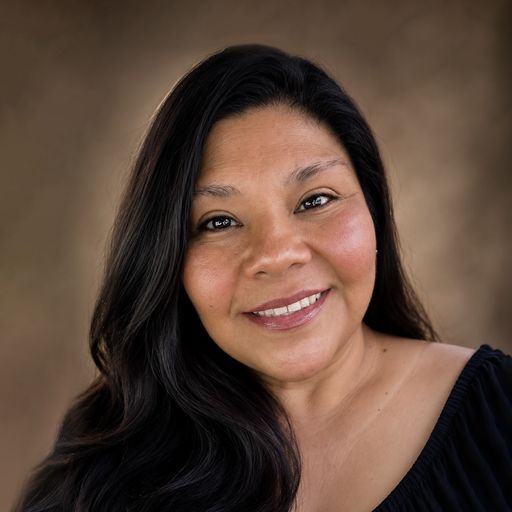A headshot image of Maria Iniquez