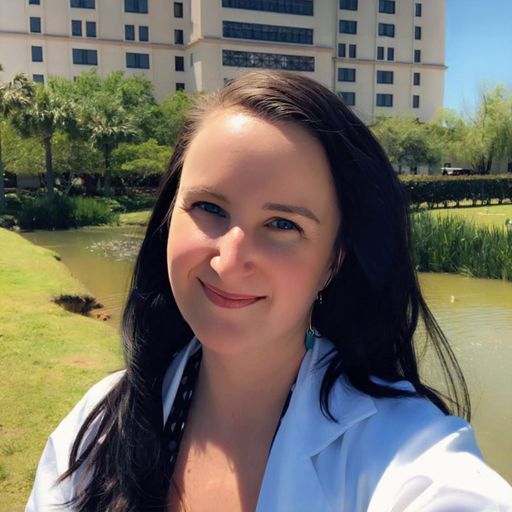 A headshot image of Michaela Garrison