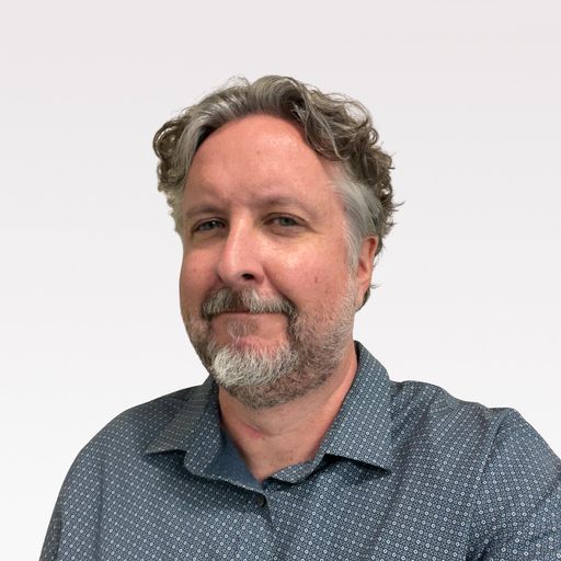 A headshot image of Michael Carroll