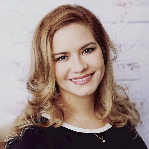 A headshot image of Maria Sandi