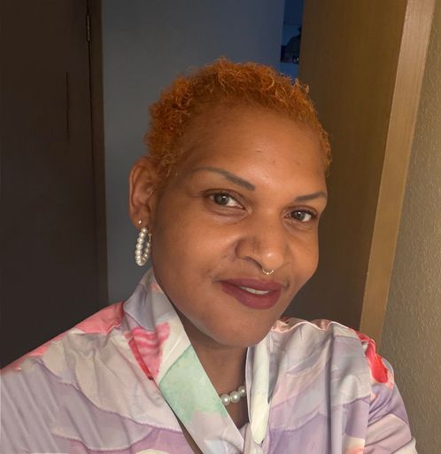 A headshot image of Janelle Alexander
