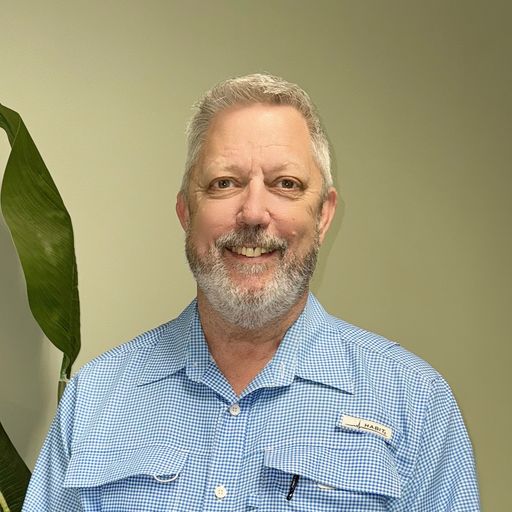 A headshot image of Travis Johnson