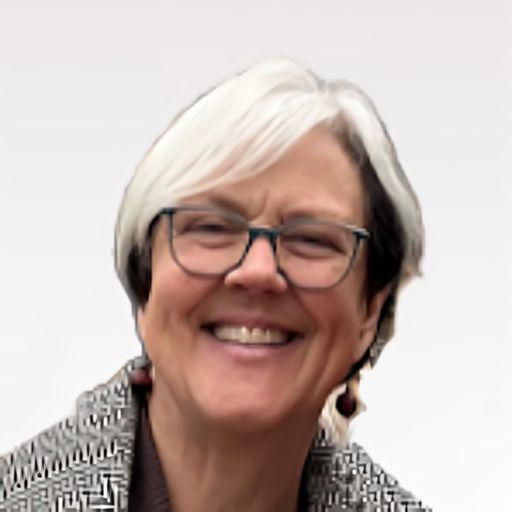 A headshot image of Dominique Walmsley