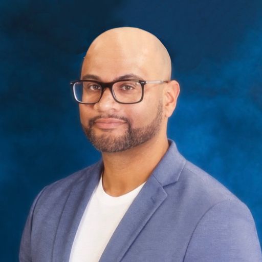 A headshot image of Huey Fairweather