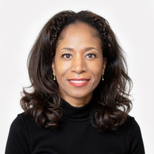 A headshot image of Gina Ashman