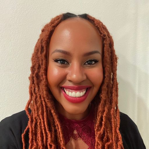 A headshot image of Ester Raha Nyaggah