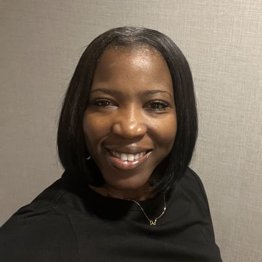A headshot image of Keesha Sledge
