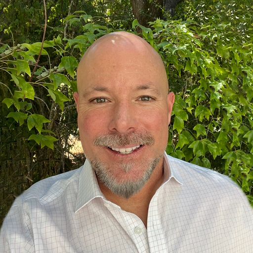 A headshot image of Tosh Fritsch