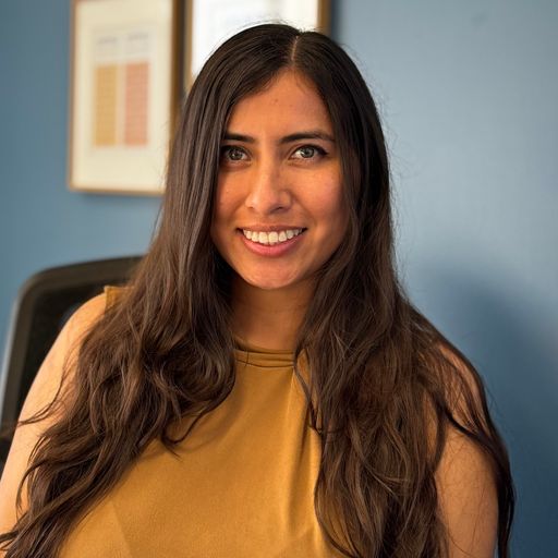 A headshot image of Reyna Moreno