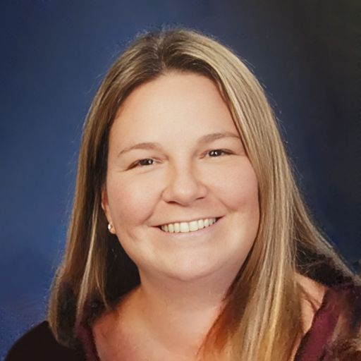 A headshot image of Kasi Barkawi-Buck