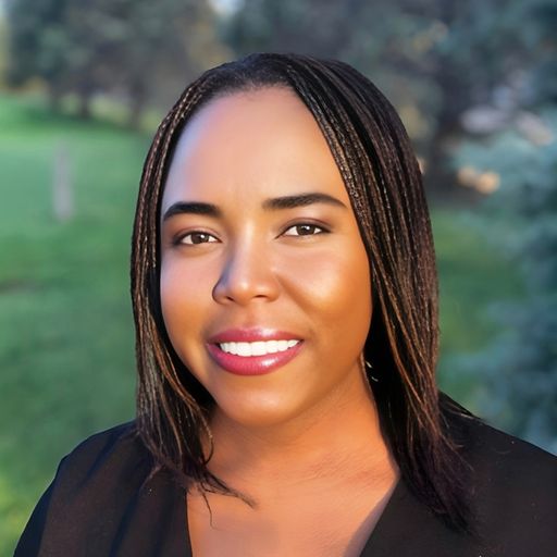 A headshot image of Happiness Nwadike