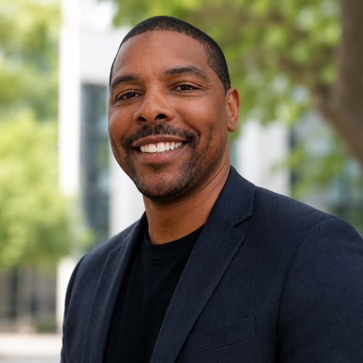 A headshot image of Kameron Beckett