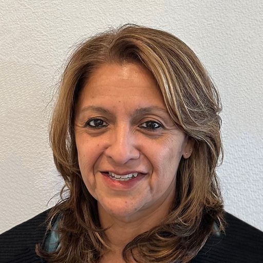 A headshot image of Delia Castaneda