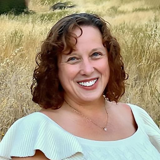 A headshot image of Suzanne Pugliese