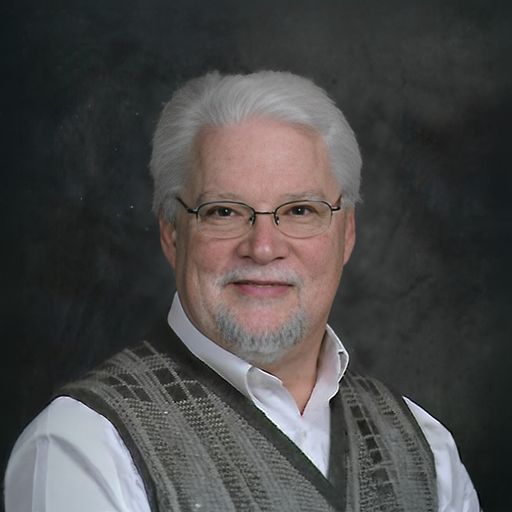 A headshot image of Mark Anderson