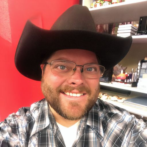 A headshot image of Luke Hatch