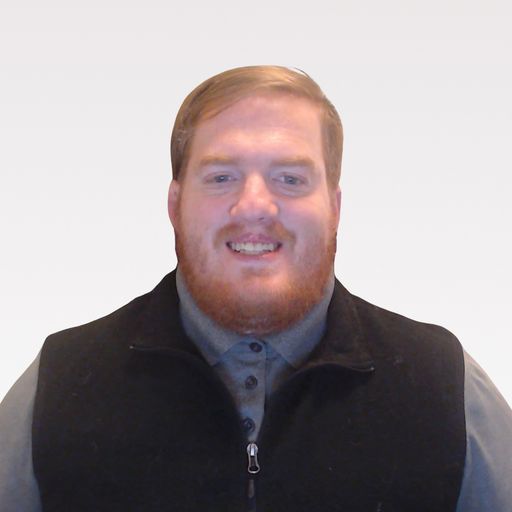 A headshot image of Tyler Barmby