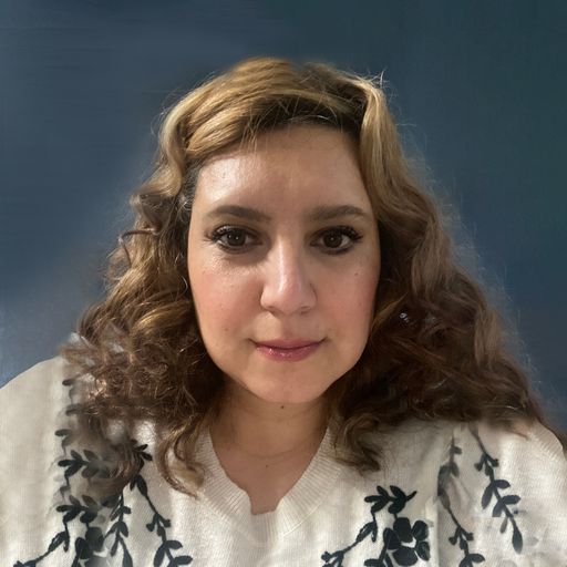 A headshot image of Carmela Duarte