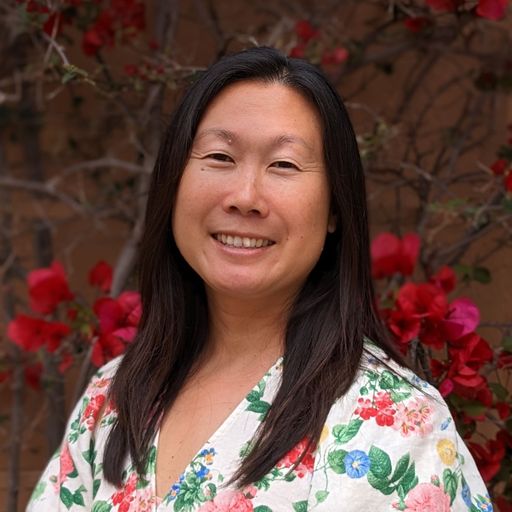 A headshot image of Han Thacker