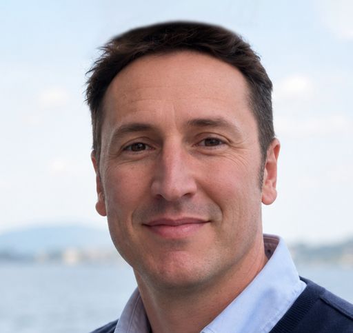 A headshot image of Mark Bourassa