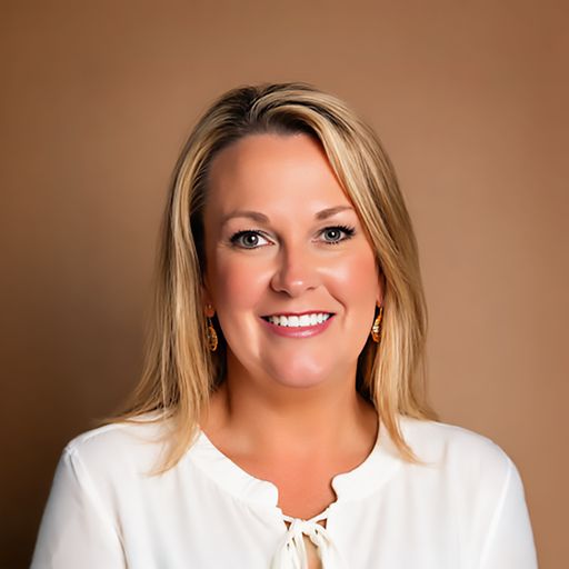 A headshot image of Carin Grove
