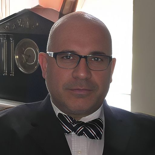 A headshot image of Pablo Arriaza