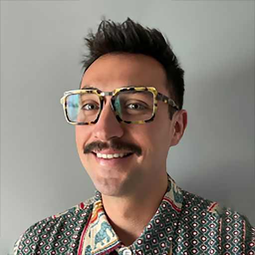 A headshot image of Andrew Yazbak